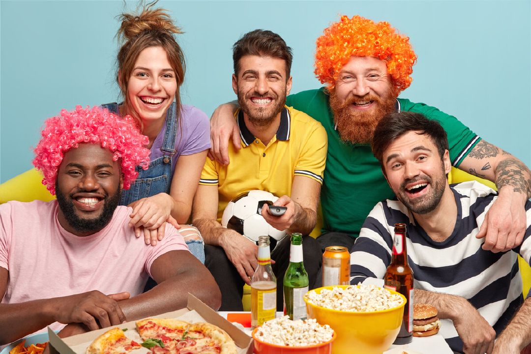 images/cheerful-five-companions-smile-broadly-express-positive-emotions-exhilaration-observe-sport-game-hold-football-attribute-laugh-gladfully-as-favorite-team-wins-opponent-eat-popcorn-drink-beer.jpg